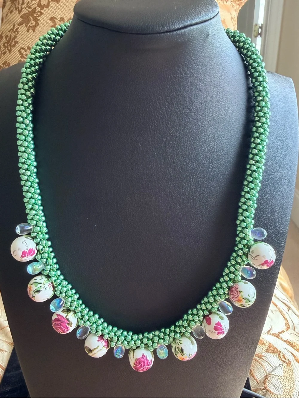 Green Beaded Necklace with Floral Accent Drops